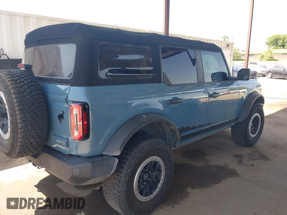 2022 Ford Bronco with VIN 1FMEE5DP9NLB61055, listed as a IAAI auction lot 42359888 with 70,668 mi miles and . Bid and sale history available at DreamBid. Image 4.