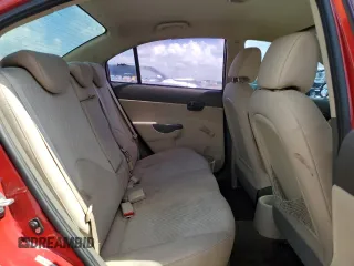 2011 Hyundai Accent GLS z VIN KMHCN4AC6BU621572, wystawiony jako Copart lot #57753025 z przebiegiem 108 395 mil mil oraz Szkoda całkowita • Salvage title. Historia ofert i sprzedaży dostępna na DreamBid. Obrazek 10.