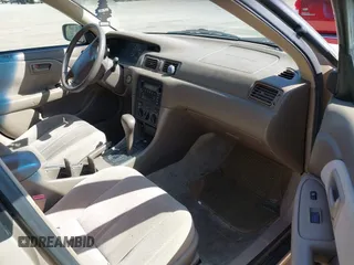 2001 Toyota Camry CE with VIN JT2BG22K910581703, listed as a IAAI auction lot 42020085 with 107,035 mi miles. Bid and sale history available at carsss.com. Image 5.