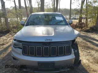 2016 Jeep Grand Cherokee Limited 75th Anniversary with VIN 1C4RJFBT9GC400873, listed as a IAAI auction lot 41834112 with 110,457 mi miles and . Bid and sale history available at DreamBid. Image 6.