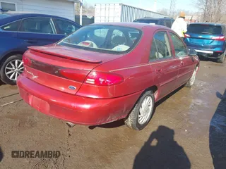 1999 Ford Escort SE with VIN 1FAFP13P6XW180845, listed as a IAAI auction lot 41398242 with 59,300 mi miles. Bid and sale history available at carsss.com. Image 4.