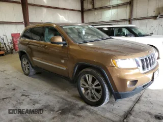 2011 Jeep Grand Cherokee Laredo with VIN 1J4RR4GG6BC675290, listed as a Copart auction lot 47627585 with 142,195 mi miles and Salvage Title. Bid and sale history available at carsss.com. Image 4.