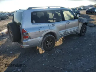 2001 Mitsubishi Montero Limited z VIN JA4MW51R81J030640, wystawiony jako Copart lot #47873715 z przebiegiem Nie podano mil oraz Szkoda całkowita • Salvage title. Historia ofert i sprzedaży dostępna na DreamBid. Obrazek 3.