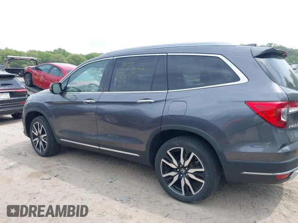 2020 Honda Pilot Elite with VIN 5FNYF6H00LB027472, listed as a IAAI auction lot 42253478 with 69,988 mi miles and . Bid and sale history available at DreamBid. Image 14.