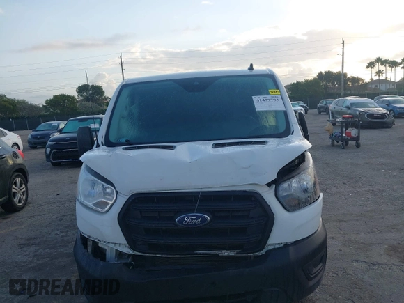 2020 Ford Transit Cargo with VIN 1FTBR1Y80LKB45384, listed as a IAAI auction lot 41479703 with 63,232 mi miles and . Bid and sale history available at DreamBid. Image 12.