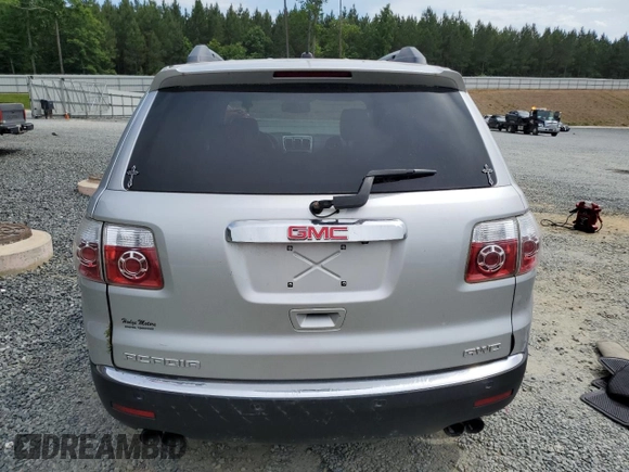 2010 GMC Acadia SLT1 z VIN 1GKLVMED5AJ184403, wystawiony jako Copart lot #57793625 z przebiegiem 174 730 mil mil oraz Czysty tytuł • Clean title. Historia ofert i sprzedaży dostępna na DreamBid. Obrazek 6.