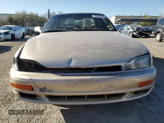 1994 Toyota Camry XLE with VIN JT2GK13E0R0017831, listed as a Copart auction lot 49887485 with 143,303 mi miles and Salvage Title. Bid and sale history available at carsss.com. Image 5.