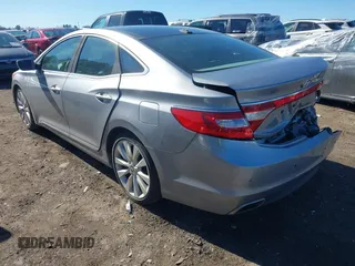 2016 Hyundai Azera Limited z VIN KMHFH4JGXGA568911, wystawiony jako IAAI lot #41428434 z przebiegiem 158 202 mil mil oraz . Historia ofert i sprzedaży dostępna na DreamBid. Obrazek 3.