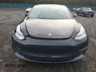 2019 Tesla Model 3 Mid Range with VIN 5YJ3E1EAXKF305080, listed as a Copart auction lot 49899965 with 88,607 mi miles and Salvage Title. Bid and sale history available at DreamBid. Image 5.