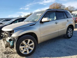 2012 Suzuki Grand Vitara Limited z VIN JS3TD0D77C4100121, wystawiony jako Copart lot #82960924 z przebiegiem 191 057 mil mil oraz Szkoda całkowita • Salvage title. Historia ofert i sprzedaży dostępna na DreamBid. Obrazek 1.