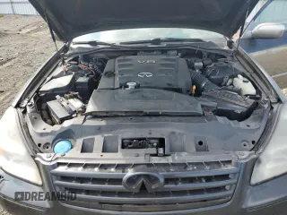 2005 Infiniti Q45 z VIN JNKBF01A45M100941, wystawiony jako Copart lot #71366494 z przebiegiem 117 616 mil mil oraz Czysty tytuł • Clean title. Historia ofert i sprzedaży dostępna na DreamBid. Obrazek 11.