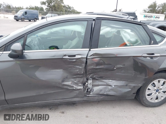 2019 Ford Fusion S with VIN 3FA6P0G79KR215541, listed as a IAAI auction lot 41626638 with 73,751 mi miles and . Bid and sale history available at DreamBid. Image 6.