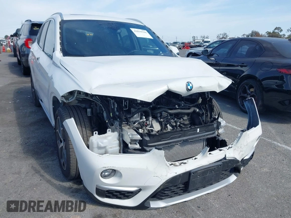2018 BMW X1 xDrive28i with VIN WBXHT3C37J5K28375, listed as a IAAI auction lot 42039336 with 28,664 mi miles. Bid and sale history available at carsss.com. Image 1.