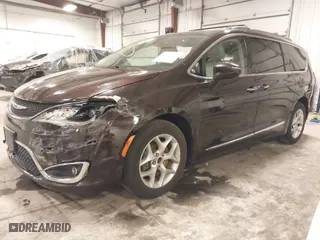 2017 Chrysler Pacifica Touring-L with VIN 2C4RC1BGXHR656447, listed as a IAAI auction lot 41046799 with 187,135 mi miles. Bid and sale history available at carsss.com. Image 2.