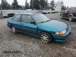 1995 Ford Escort z VIN 1FASP1284SW307142, wystawiony jako Copart lot #88531955 z przebiegiem 93 323 mil mil oraz Szkoda całkowita • Salvage title. Historia ofert i sprzedaży dostępna na DreamBid. Obrazek 4.