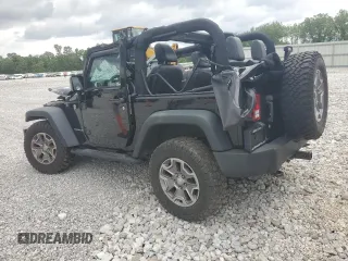 2015 Jeep Wrangler Rubicon with VIN 1C4HJWCG0FL755717, listed as a Copart auction lot 61375435 with 153,207 mi miles and Salvage title. Bid and sale history available at DreamBid. Image 2.