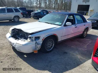 2001 Mercury Grand Marquis GS with VIN 2MEFM74W41X687586, listed as a IAAI auction lot 41778136 with 122,596 mi miles. Bid and sale history available at carsss.com. Image 2.