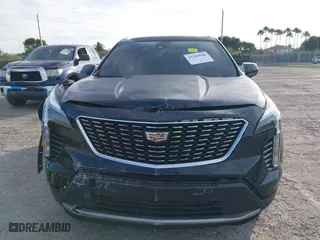 2020 Cadillac XT4 FWD Premium Luxury with VIN 1GYFZCR44LF070832, listed as a IAAI auction lot 41249608 with 77,471 mi miles. Bid and sale history available at carsss.com. Image 12.