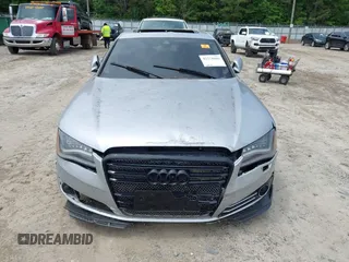 2011 Audi A8 z VIN WAUAVAFD7BN006743, wystawiony jako IAAI lot #42278486 z przebiegiem Nie podano mil oraz . Historia ofert i sprzedaży dostępna na DreamBid. Obrazek 6.