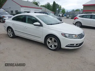 2013 Volkswagen CC Sport z VIN WVWAN7AN6DE537246, wystawiony jako IAAI lot #42361502 z przebiegiem 192 999 mil mil oraz . Historia ofert i sprzedaży dostępna na DreamBid. Obrazek 1.