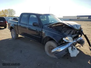 2001 Ford F-150 SuperCrew XLT with VIN 1FTRW08L61KC30586, listed as a Copart auction lot 74439124 with 296,321 mi miles and Salvage Title. Bid and sale history available at carsss.com. Image 4.