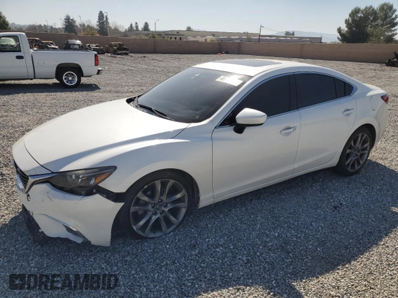 2016 Mazda 6 i Grand Touring с VIN JM1GJ1W53G1404533, выставлен на аукционе Copart как лот 46860575 с пробегом 94 105 миль миль и Списание • Salvage title. История ставок и продаж доступна на DreamBid. Изображение 1.