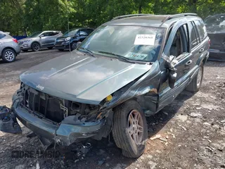 2004 Jeep Grand Cherokee Laredo with VIN 1J4GX48S34C192181, listed as a IAAI auction lot 42320368 with 181,415 mi miles and . Bid and sale history available at DreamBid. Image 2.