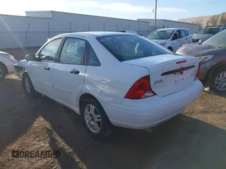 2004 Ford Focus SE with VIN 1FAFP34324W137459, listed as a IAAI auction lot 41634502 with 134,113 mi miles and . Bid and sale history available at DreamBid. Image 3.