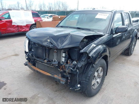 2009 Nissan Frontier SE with VIN 1N6AD07U09C404023, listed as a IAAI auction lot 41883164 with 100,724 mi miles. Bid and sale history available at carsss.com. Image 6.