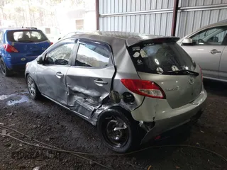 2013 Mazda 2 Sport with VIN JM1DE1KY1D0167999, listed as a IAAI auction lot 41713546 with 204,443 mi miles and . Bid and sale history available at DreamBid. Image 3.