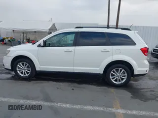 2015 Dodge Journey SXT with VIN 3C4PDDBG9FT600712, listed as a IAAI auction lot 42090741 with 111,741 mi miles and . Bid and sale history available at DreamBid. Image 14.