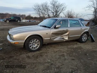 2002 Jaguar XJ 8 with VIN SAJDA14C82LF48116, listed as a Copart auction lot 86444224 with Not provided miles and Salvage title. Bid and sale history available at DreamBid. Image 1.