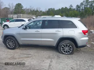 2012 Jeep Grand Cherokee Laredo with VIN 1C4RJFAG7CC189381, listed as a IAAI auction lot 41429085 with 137,238 mi miles. Bid and sale history available at carsss.com. Image 13.