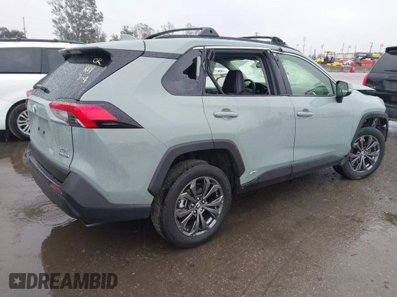 2023 Toyota RAV4 Hybrid XLE Premium with VIN JTMB6RFVXPD104349, listed as a IAAI auction lot 41730288 with 30,904 mi miles. Bid and sale history available at carsss.com. Image 4.