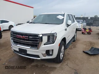 2021 GMC Yukon SLT with VIN 1GKS1BKD1MR489922, listed as a IAAI auction lot 40972652 with 77,791 mi miles. Bid and sale history available at carsss.com. Image 17.