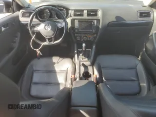 2017 Volkswagen Jetta SEL with VIN 3VWL17AJ2HM248279, listed as a Copart auction lot 59269195 with 125,248 mi miles and Salvage title. Bid and sale history available at DreamBid. Image 8.