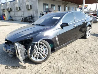 2014 Chevrolet SS z VIN 6G3F15RW3EL933153, wystawiony jako Copart lot #72327654 z przebiegiem 125 277 mil mil oraz Szkody całkowita. Historia ofert i sprzedaży dostępna na DreamBid. Obrazek 1.