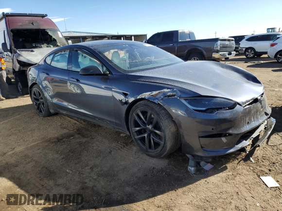 2023 Tesla Model S Plaid with VIN 5YJSA1E64PF499373, listed as a Copart auction lot 78744674 with Not provided miles and Salvage title. Bid and sale history available at DreamBid. Image 4.