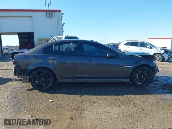 2009 Pontiac G8 GT with VIN 6G2EC57Y79L208207, listed as a IAAI auction lot 41232537 with 180,614 mi miles. Bid and sale history available at carsss.com. Image 14.