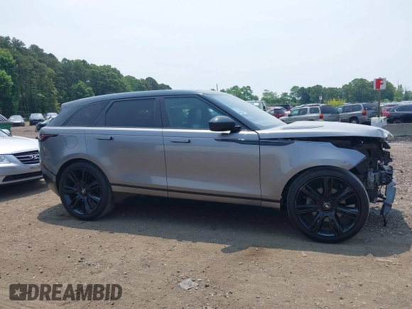 2020 Land Rover Range Rover Velar z VIN SALYM2EV8LA274870, wystawiony jako IAAI lot #42479938 z przebiegiem 43 039 mil mil oraz . Historia ofert i sprzedaży dostępna na DreamBid. Obrazek 13.