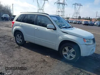 2006 Suzuki Grand Vitara Luxury z VIN JS3TE947664101797, wystawiony jako IAAI lot #41589092 z przebiegiem 159 153 mil mil oraz . Historia ofert i sprzedaży dostępna na DreamBid. Obrazek 1.
