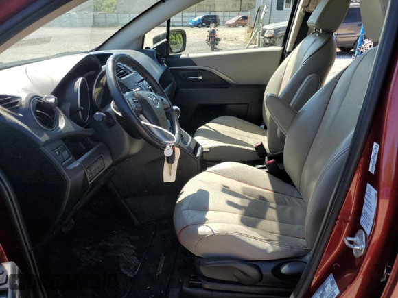 2012 Mazda 5 Grand Touring with VIN JM1CW2DL0C0139724, listed as a Copart auction lot 70640054 with 92,129 mi miles and Salvage Title. Bid and sale history available at DreamBid. Image 7.