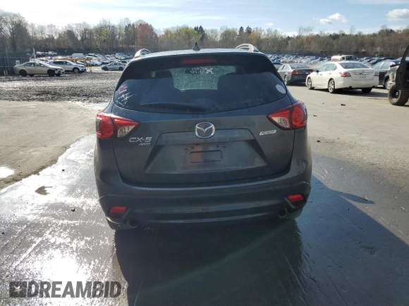 2016 Mazda CX-5 Grand Touring with VIN JM3KE4DY0G0679190, listed as a Copart auction lot 53619495 with 154,649 mi miles and Salvage Title. Bid and sale history available at carsss.com. Image 6.