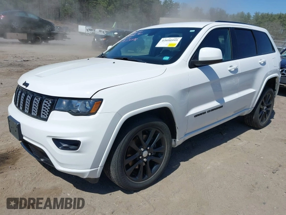 2021 Jeep Grand Cherokee Freedom with VIN 1C4RJFAG0MC856308, listed as a IAAI auction lot 42050995 with 35,428 mi miles and . Bid and sale history available at DreamBid. Image 2.
