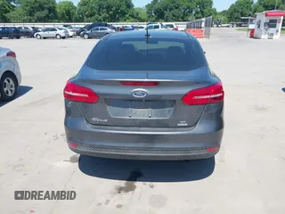2018 Ford Focus SE with VIN 1FADP3FE3JL204220, listed as a IAAI auction lot 41972960 with 62,682 mi miles and . Bid and sale history available at DreamBid. Image 16.