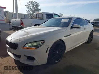 2012 BMW 6 Series 650i with VIN WBALX3C52CC528401, listed as a IAAI auction lot 42046910 with 105,844 mi miles. Bid and sale history available at carsss.com. Image 19.