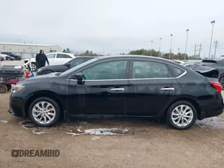 2018 Nissan Sentra SV with VIN 3N1AB7AP9JL631159, listed as a IAAI auction lot 41596393 with 85,860 mi miles and . Bid and sale history available at DreamBid. Image 14.