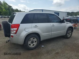 2006 Suzuki Grand Vitara z VIN JS3TE941764101657, wystawiony jako Copart lot #54943205 z przebiegiem 206 744 mil mil oraz Szkody całkowita. Historia ofert i sprzedaży dostępna na DreamBid. Obrazek 3.