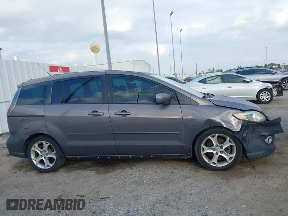 2009 Mazda 5 Sport with VIN JM1CR29L990341261, listed as a IAAI auction lot 41522567 with 123,465 mi miles and . Bid and sale history available at DreamBid. Image 13.