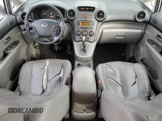 2009 Kia Rondo LX Base with VIN KNAFG528097222268, listed as a Copart auction lot 77797124 with 184,569 mi miles and Salvage Title. Bid and sale history available at carsss.com. Image 8.